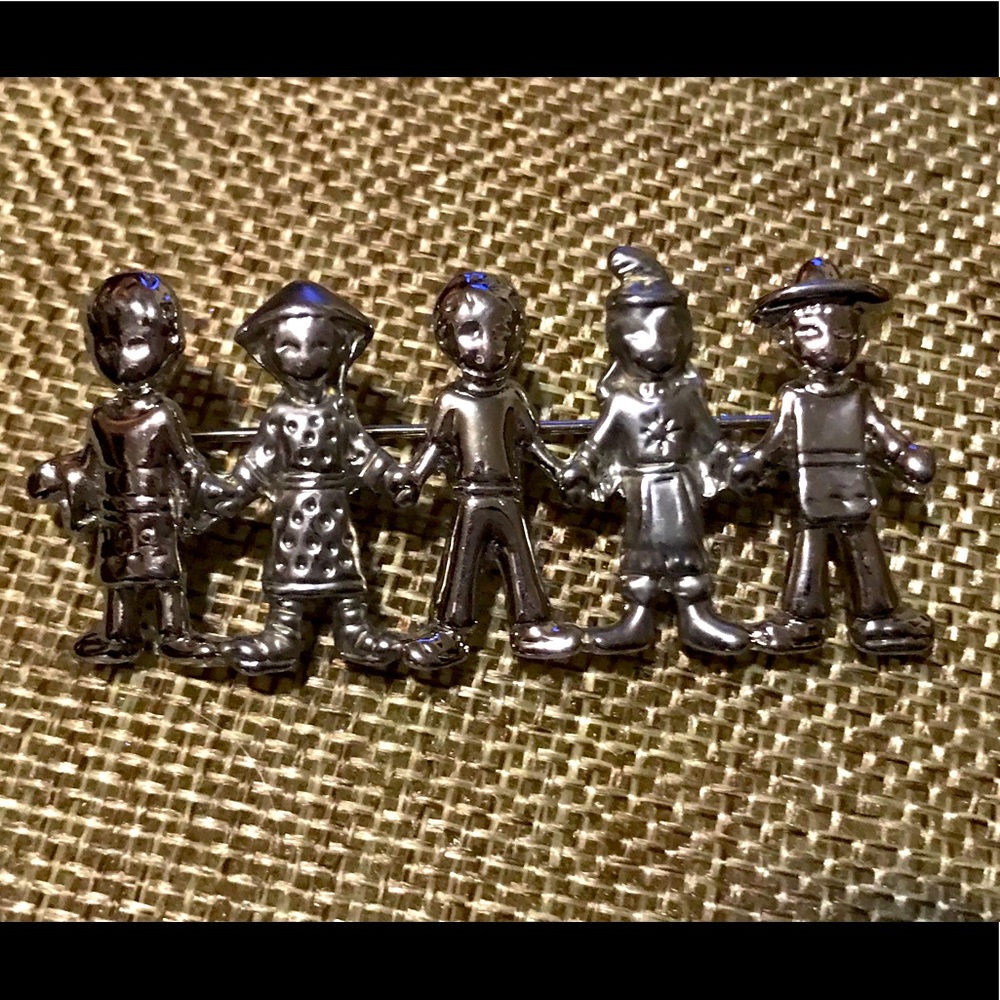 Children of the world brooch